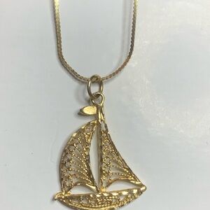 14kt Solid Gold Sailboat Pendant Necklace. Stunning no kinks.Perfect shape!
